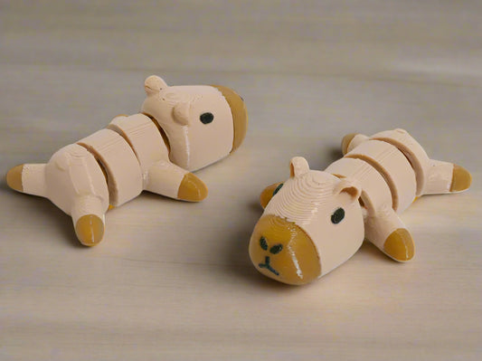 Two beige and brown dog-shaped slippers on a white background